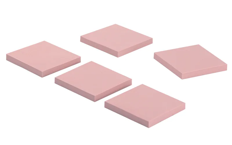 Double sided adhesive thermal pads